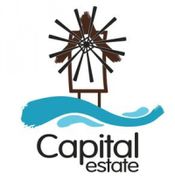 Капитал Естейт Logo